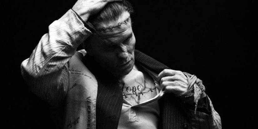 Christian Bale slicking his hair back as Frankenstein's Monster in The Bride