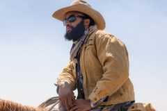Colby (Denim Richards) on horseback in Yellowstone season 5, episode 6, Cigarettes, Whiskey, a Meadow and You