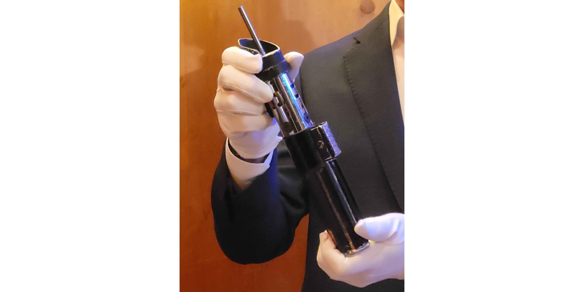 Darth Vader Hero Lightsaber Propstore held up by Brand Alinger