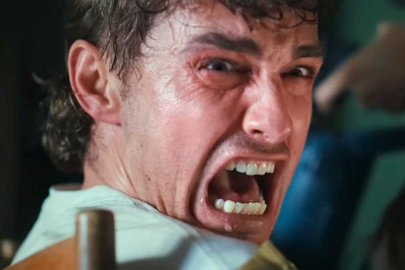 Dave Franco screaming in pain in Together 2025