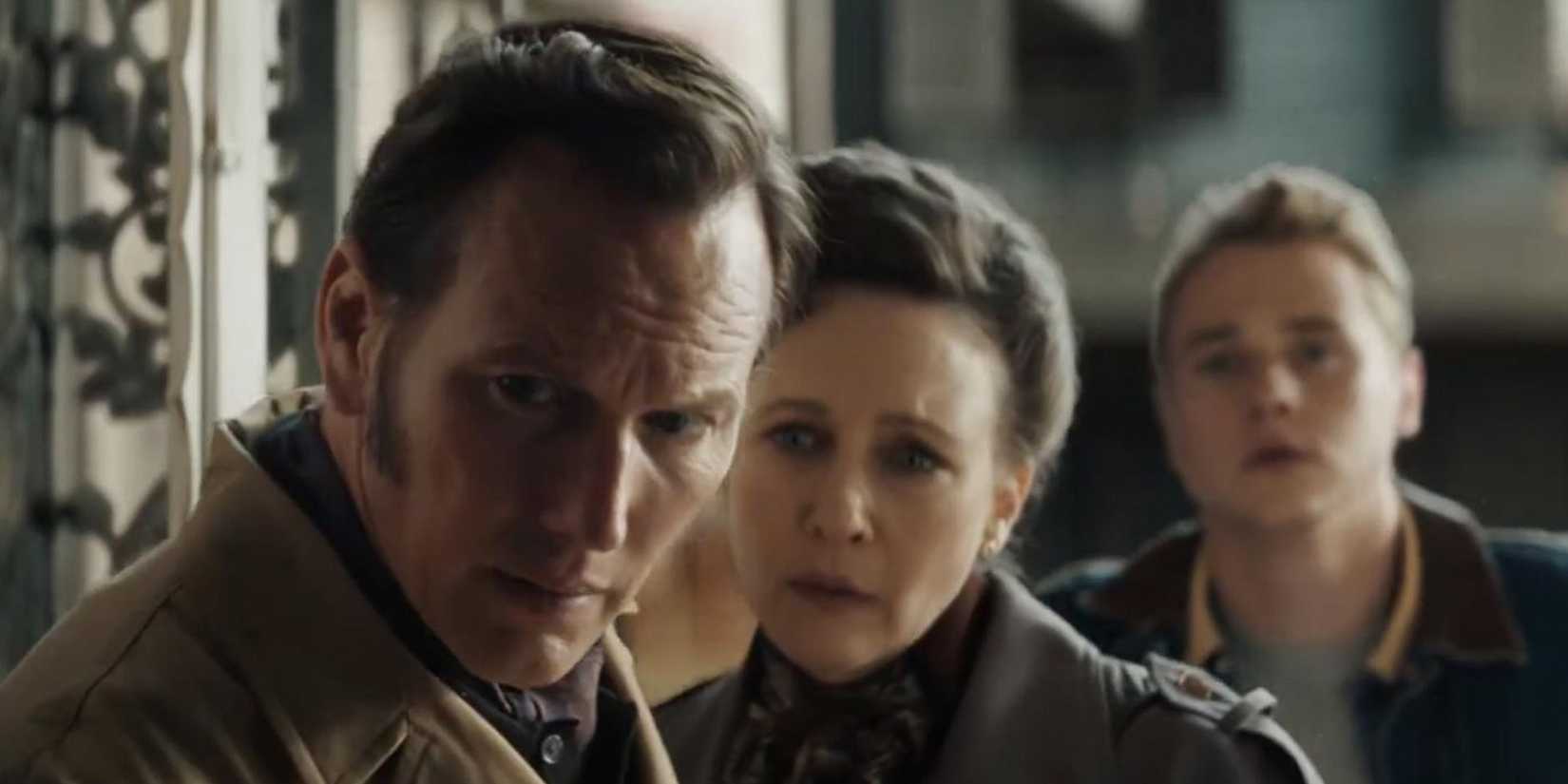 Ed and Lorraine Warren looking distressed in a house in The Conjuring Last Rites