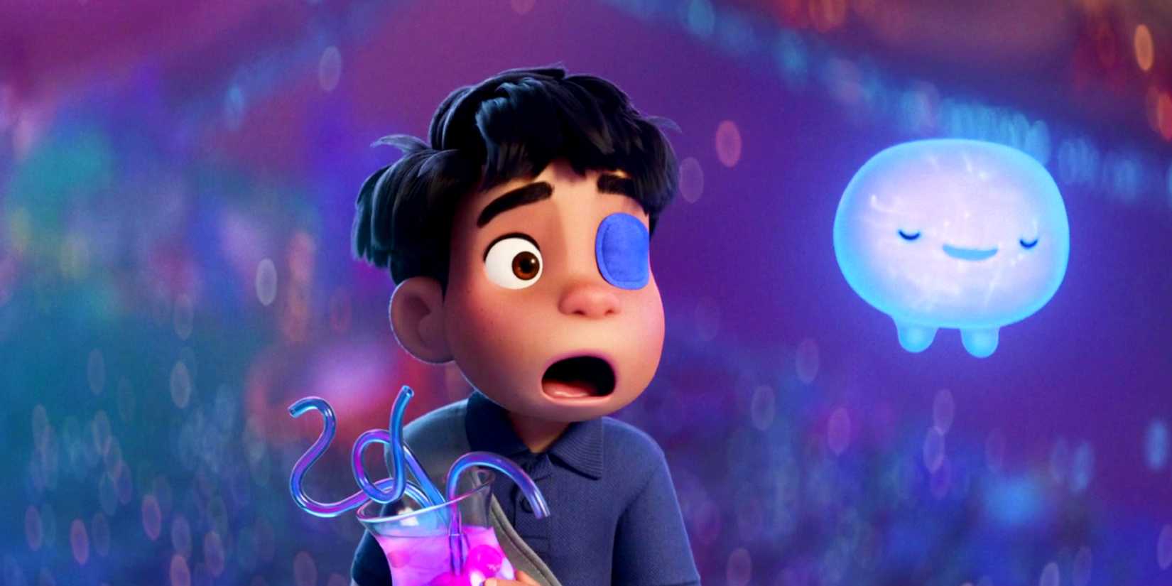 Elio looking shocked while holding a colorful drink in Elio