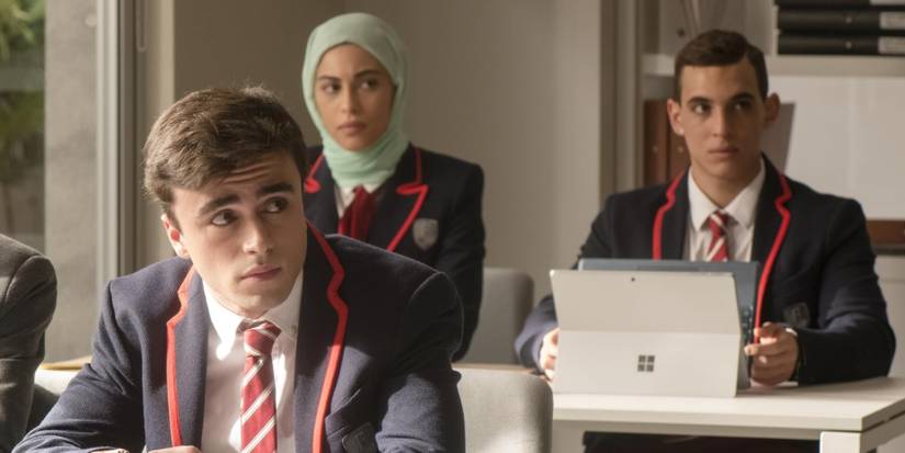 Three students in Elite sitting in class