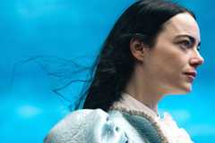 Emma Stone looking wistful in Poor Things