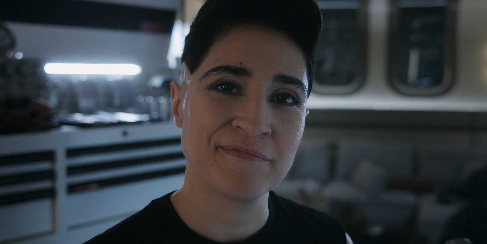 Erica Ortegas smiles in her quarters