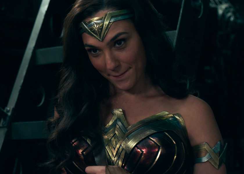 Gal Gadot's Wonder Woman biting her lip happily in Justice League