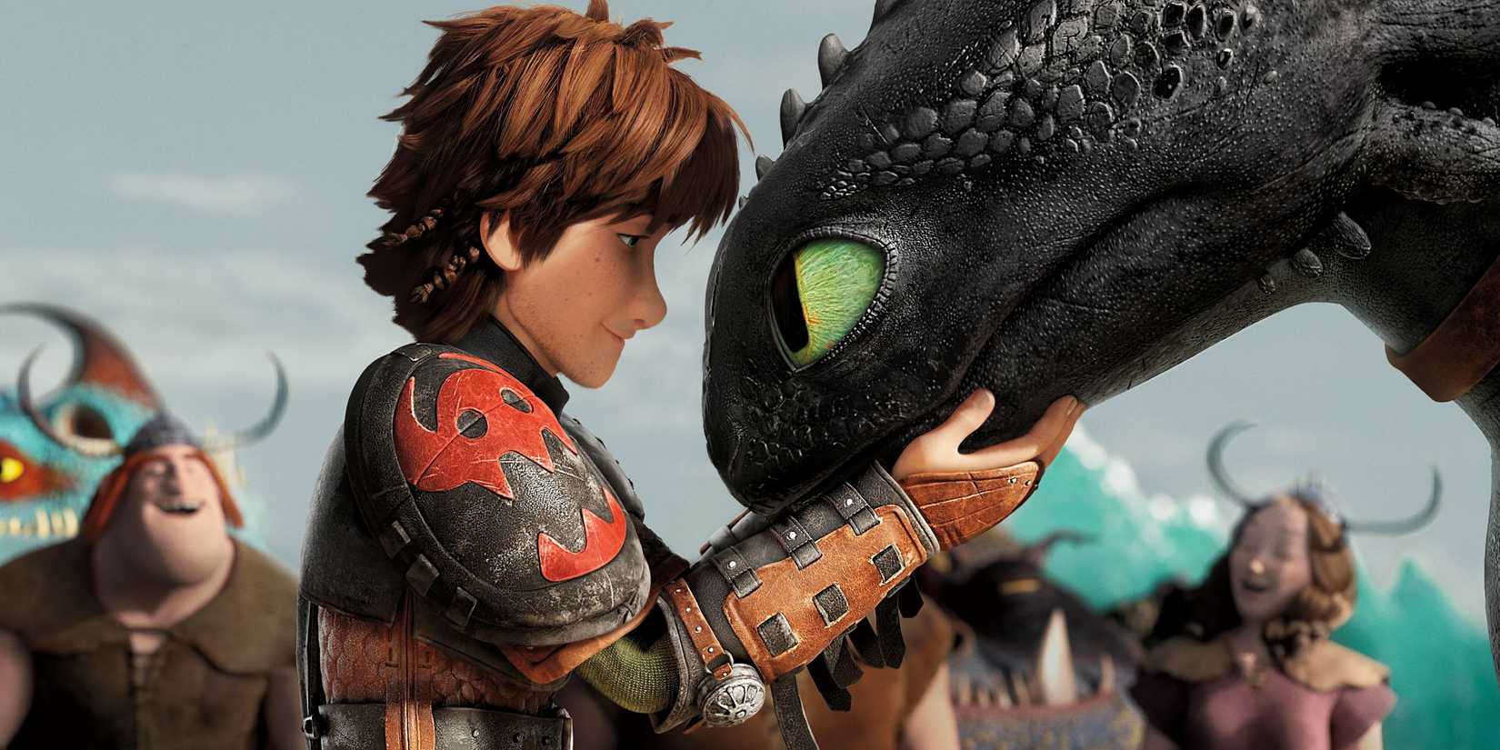 Hiccup holding Toothless' head in his hands in How to Train Your Dragon 2 (2014)