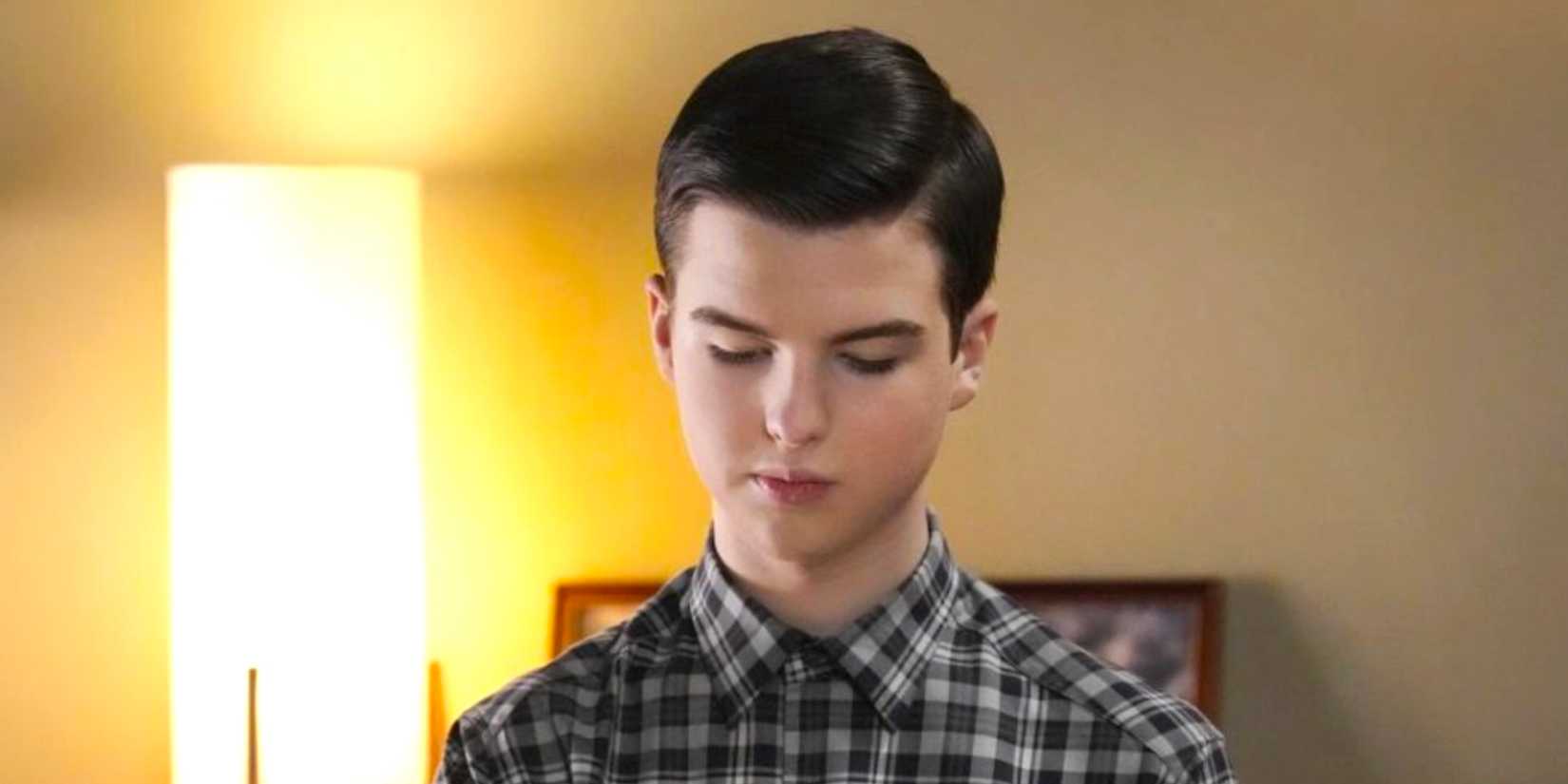 Iain Armitage's Sheldon sits at a desk in Young Sheldon season 7