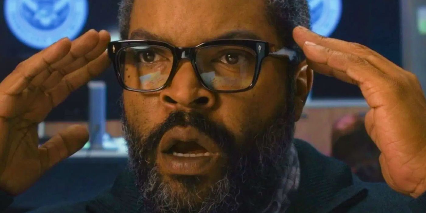 Ice Cube looking shocked with his hands to his temples in War of the Worlds 2025