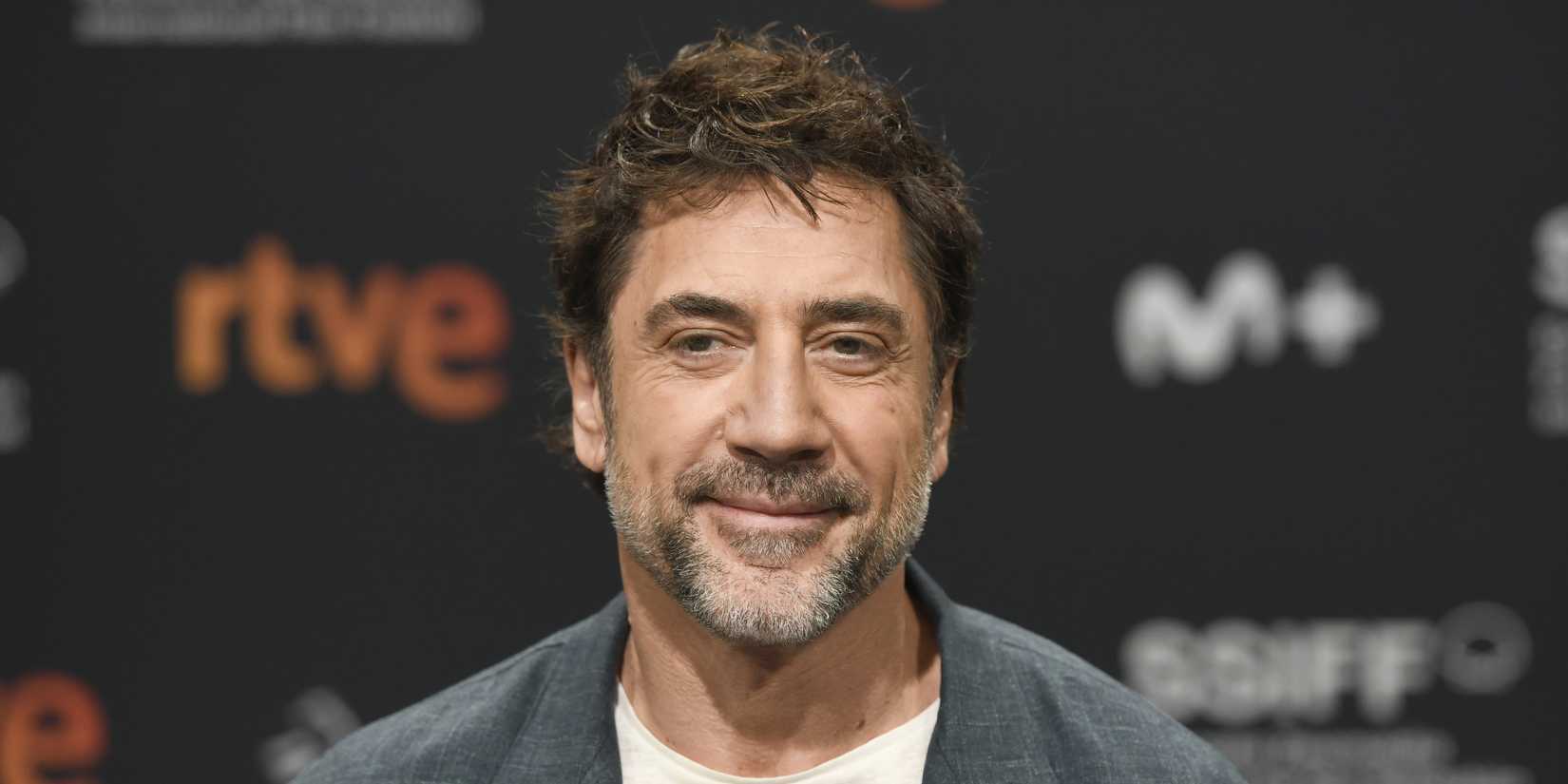 Javier Bardem smiling on the red carpet