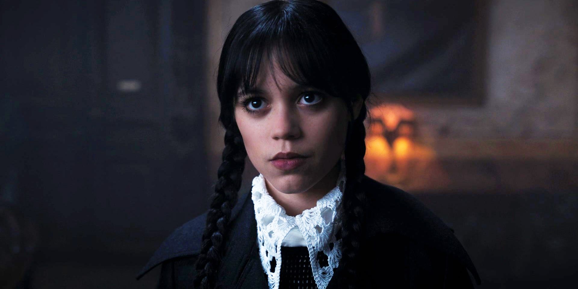 Jenna Ortega staring ahead as Wednesday in the season 1 finale