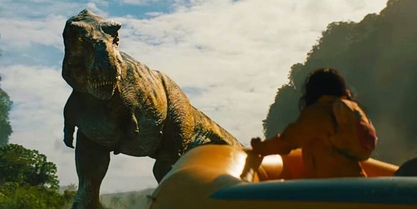 A T-rex staring at Isabella on the raft in Jurᴀssic World Rebirth.