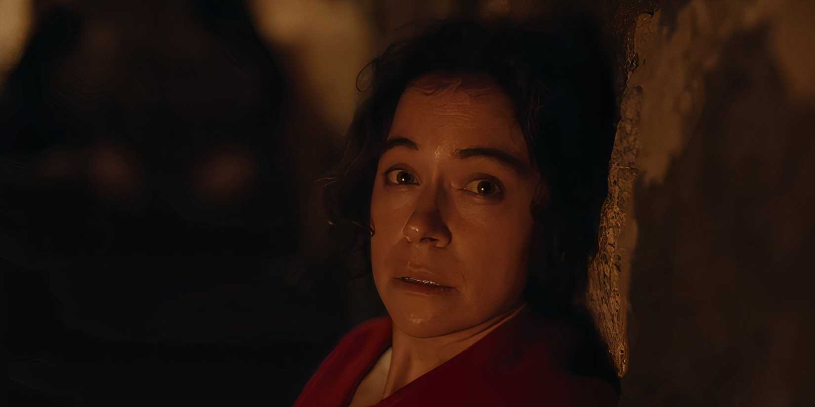 Tatiana Maslany looking scared in the horror film Keeper
