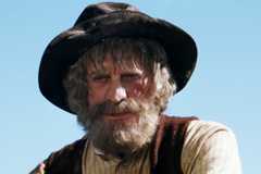 Kirk Douglas as Spur on horseback in The Man From Snowy River