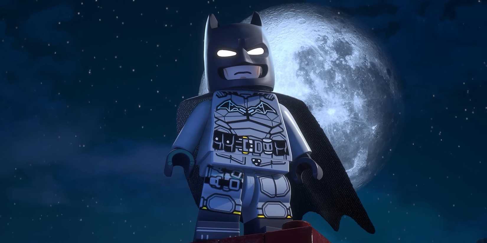 Lego Batman stands in front of the moon in LEGO Batman Legacy of the Dark Knight Moon.
