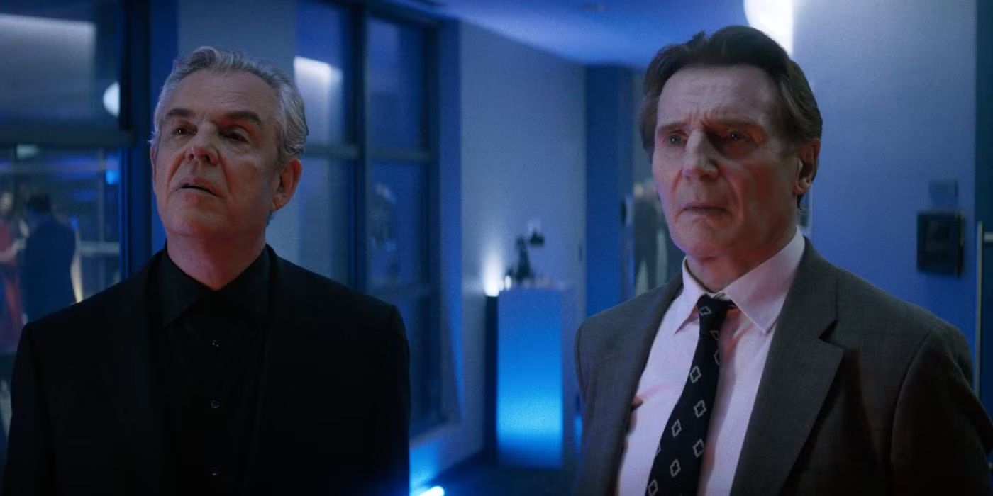 Liam Neeson and Danny Huston standing together in The Naked Gun