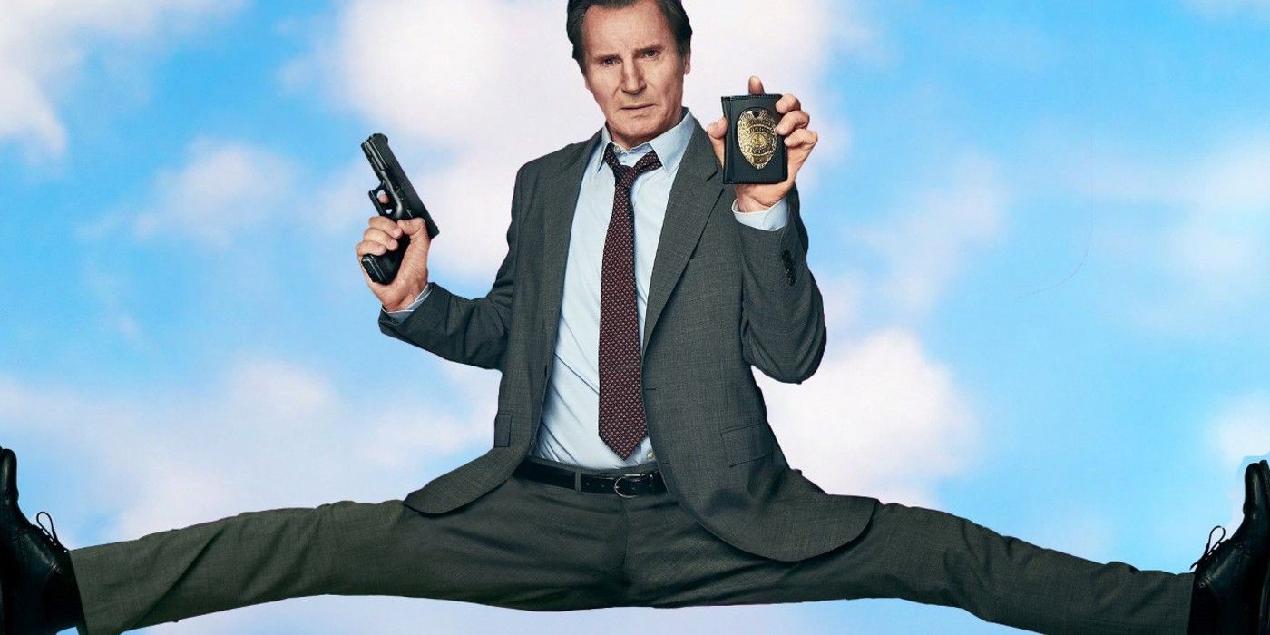 Liam Neeson in a deep split holding a gun and a badge in the new Naked Gun