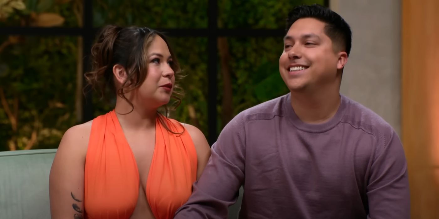 Liz Woods and Jayson Zuniga In 90 Day Fiance at Tell All holding hands on couch
