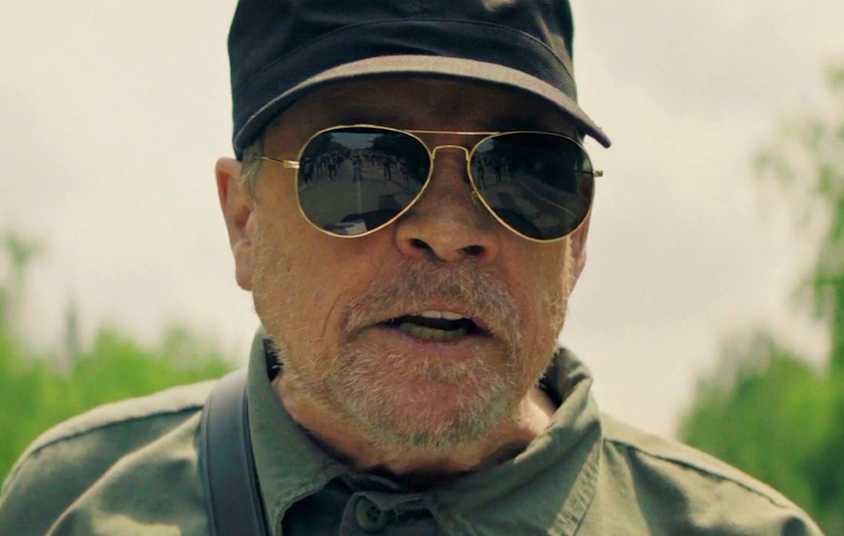Mark Hamill wearing sunglasses in The Long Walk