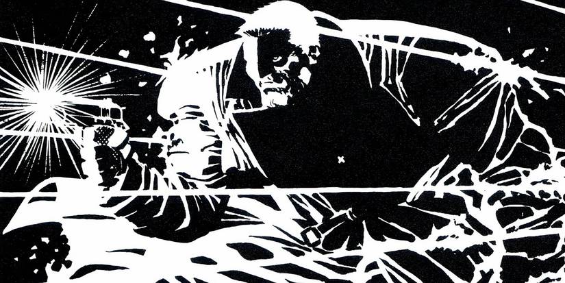 Marv from Sin City shooting a pistol.