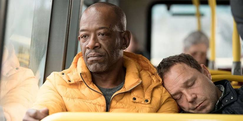 Melon (Stephen Graham) sleeping on Nelly's (Lennie James) shoulder on a bus in Save Me.
