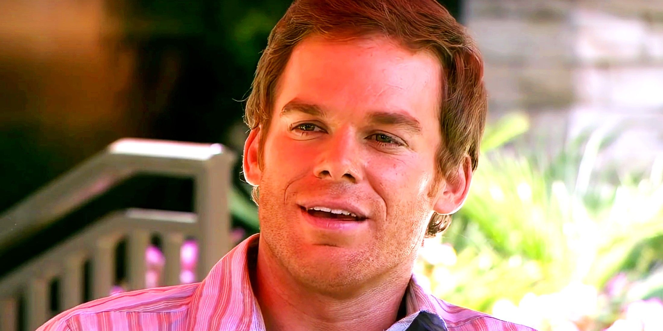 Michael C Hall as Dexter Morgan smiling in Dexter season 2