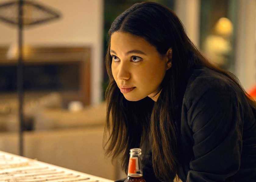 Michelle leaning over a table in Smoke episode 7