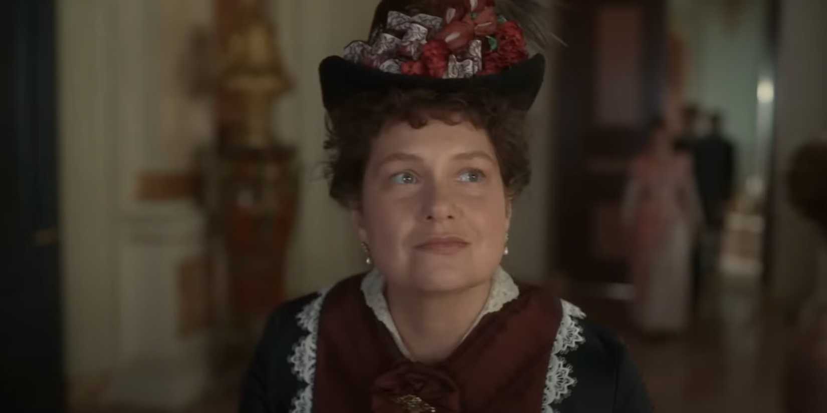 Monica O'Brien smirking in the gilded age