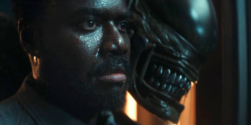 Morrow with the Xenomorph looming over his shoulder in Alien Earth episode 2