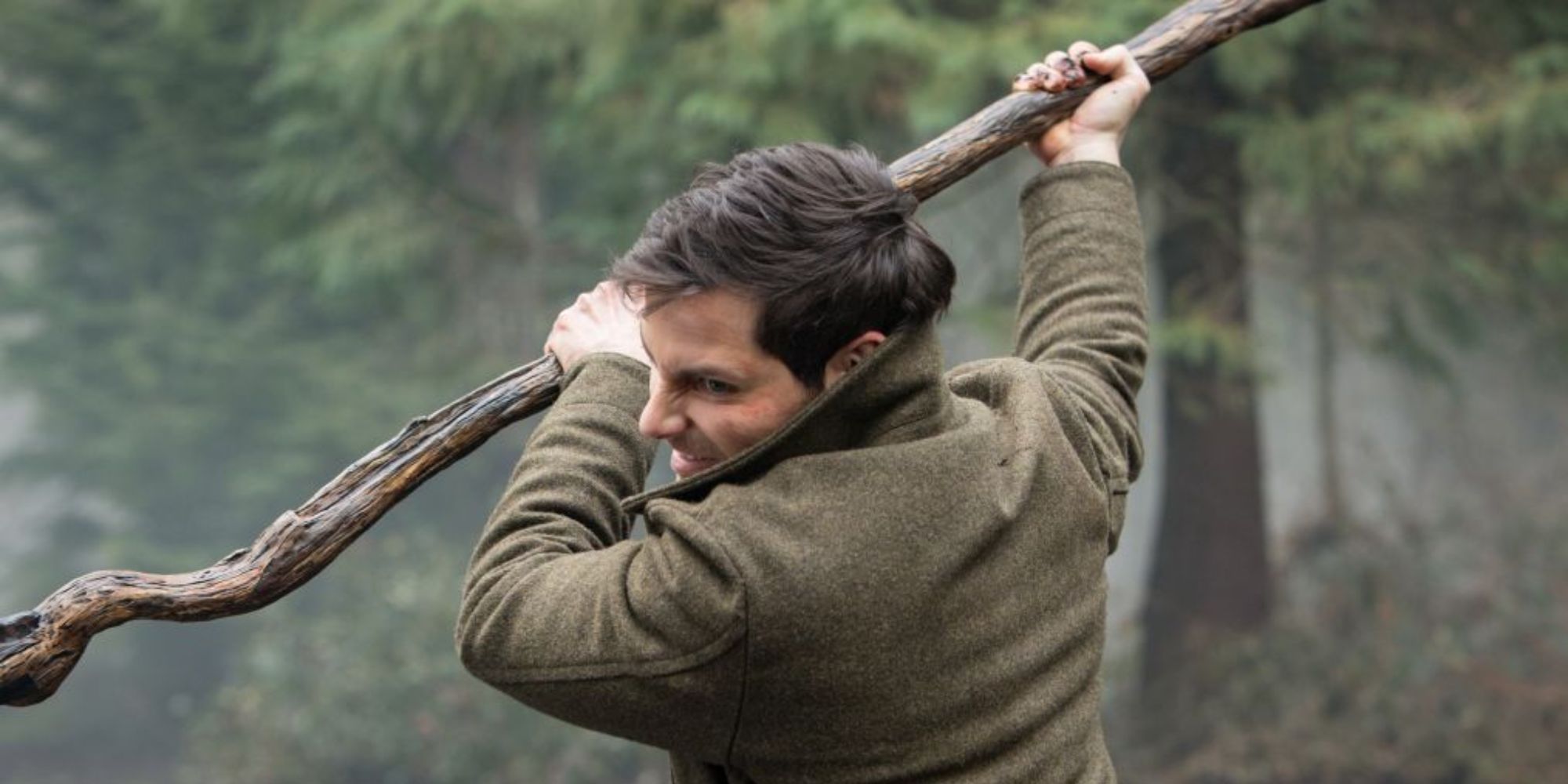 Nick (David Giuntoli) fighting with a stick in Grimm.
