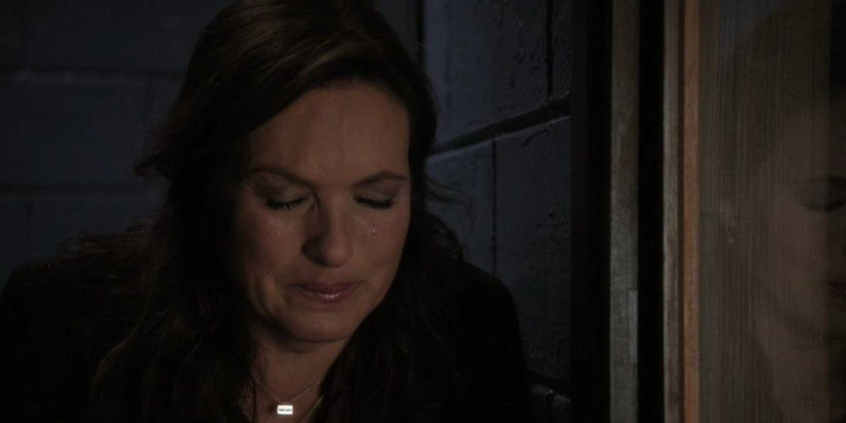 Olivia Benson (Mariska Hargitay) crying outside an interrogation room in Law & Order: SVU episode "Scorched Earth"