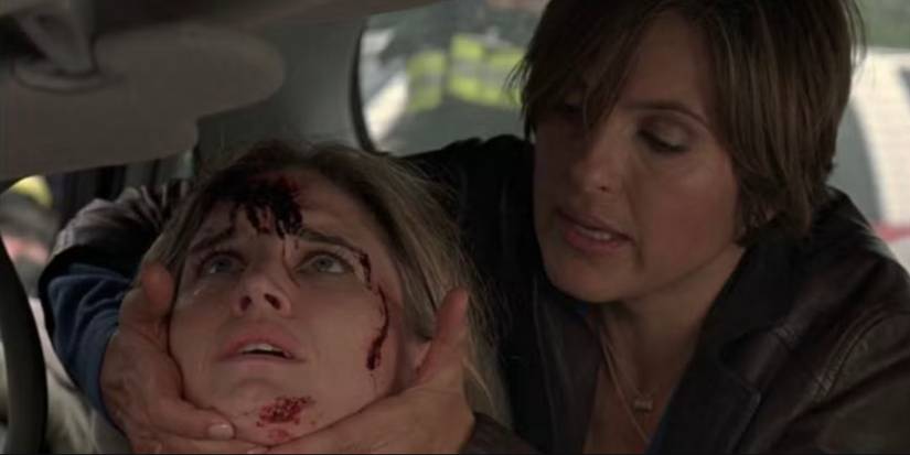 Olivia Benson (Mariska Hargitay) stabilizes Kathy Stabler) after an accident in the Law & Order: SVU episode "Paternity"