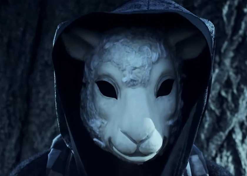 Character with a creepy mask on in Orphan Black season 4
