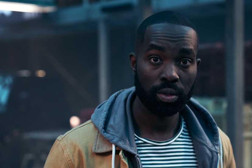Paapa Essiedu as George looking surprised