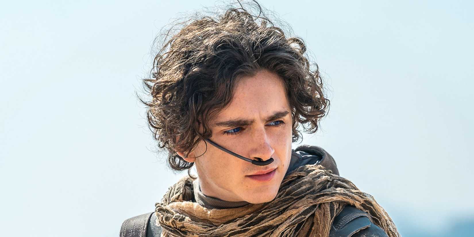 Paul with a stern expression looking off to the side in Dune 2