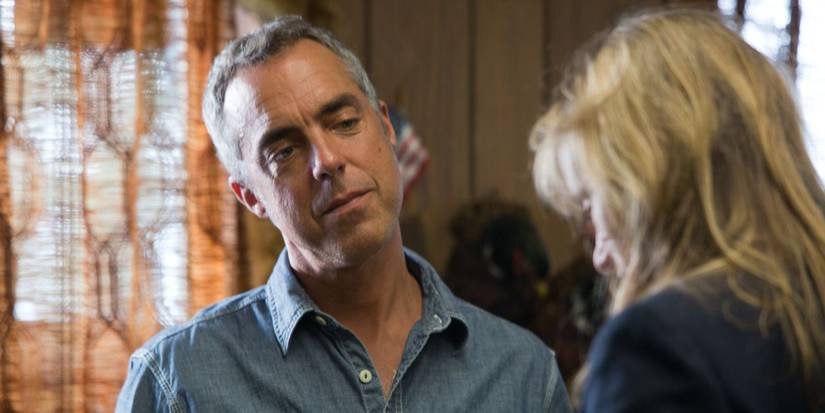 Titus Welliver looks on blankly in Promised Land