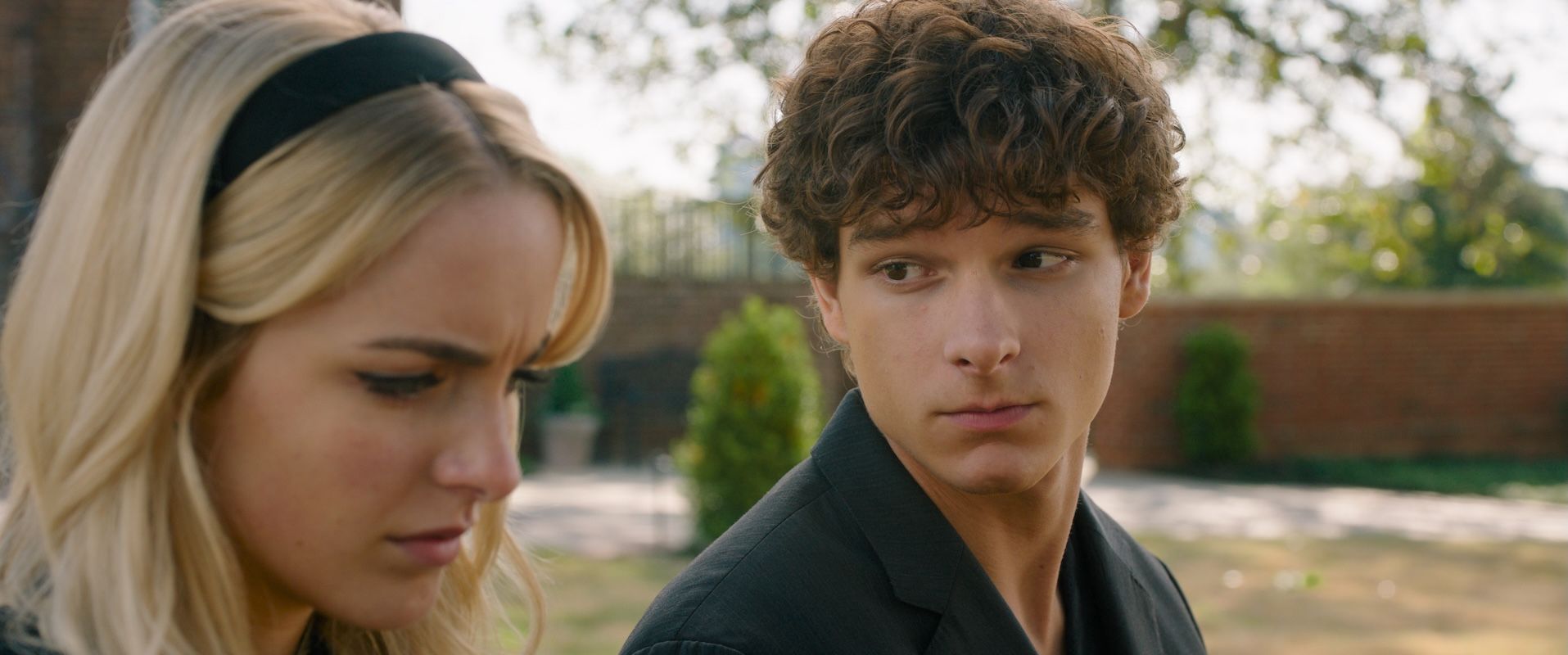 Mckenna Grace as Clara and Mason Thames as Miller talking in Regretting You