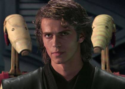 Anakin Skywalker (Hayden Christensen) faces General Grievous (offscreen) with two battle droids positioned behind him.