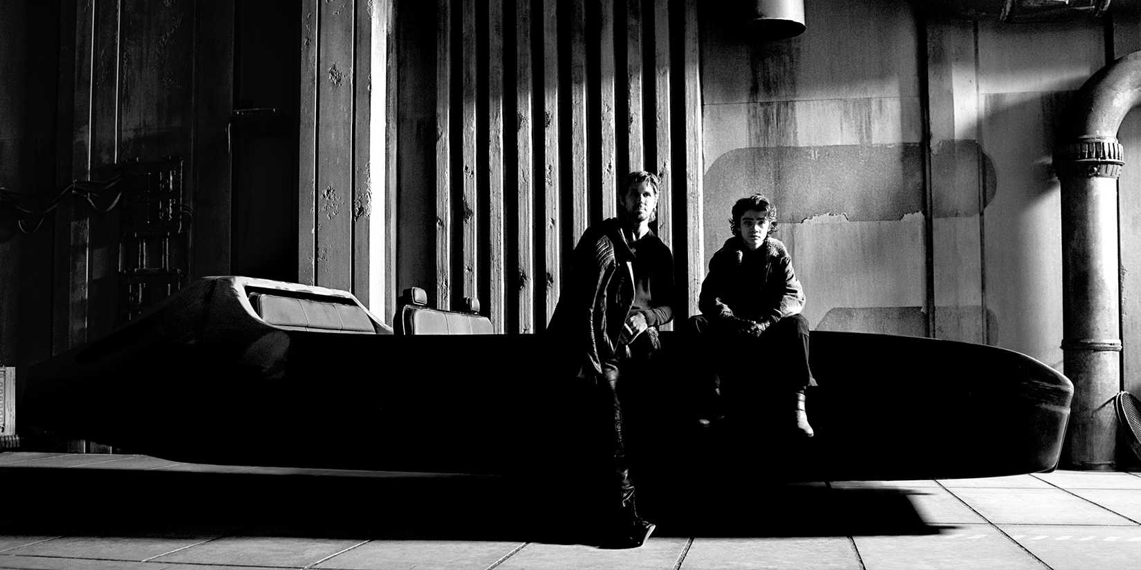 Ryan Gosling and Flynn Gray stand and sit side-by-side on the set of Star Wars: Starfighter.