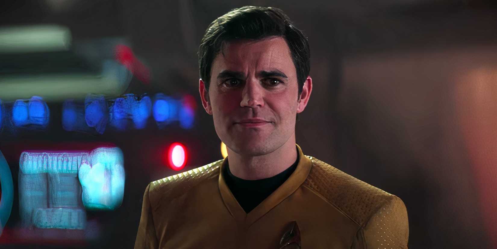 Paul Wesley smiling as Captain James T. Kirk