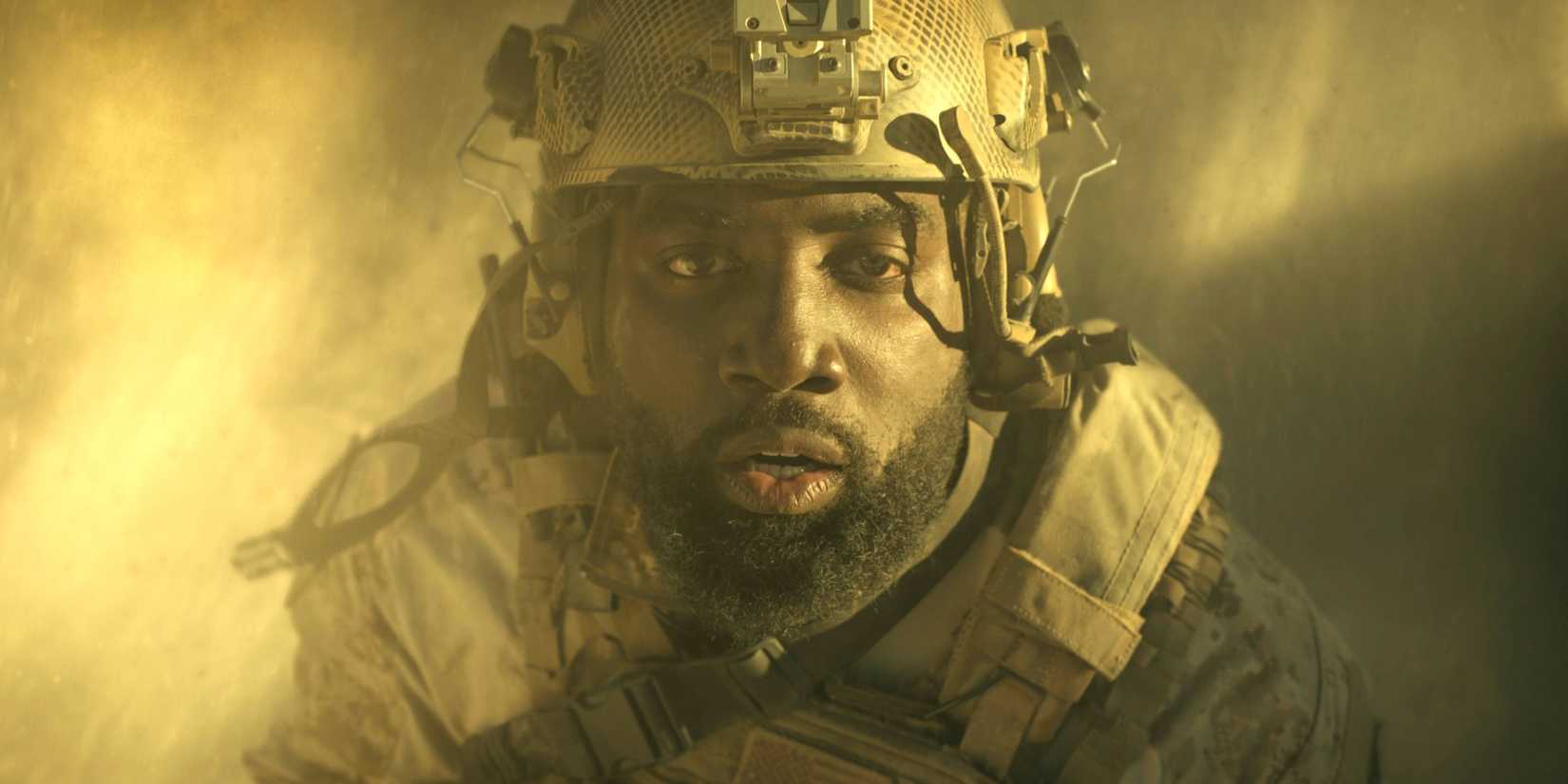 Shamier Anderson as Trevante Cole looking up with his mouth agape in Invasion