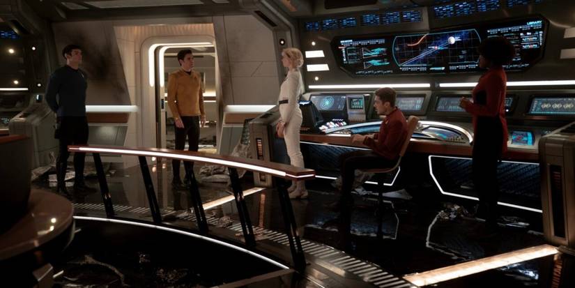 Spock, Kirk, Chapel, Scotty, and Uhura in Star Trek Strange New Worlds season 3 Sehlat Who Ate Its Tail