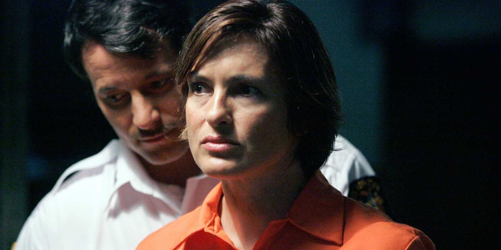 A prison guard behind Olivia Benson (Mariska Hargitay) in the Law & Order: SVU episode "Undercover"