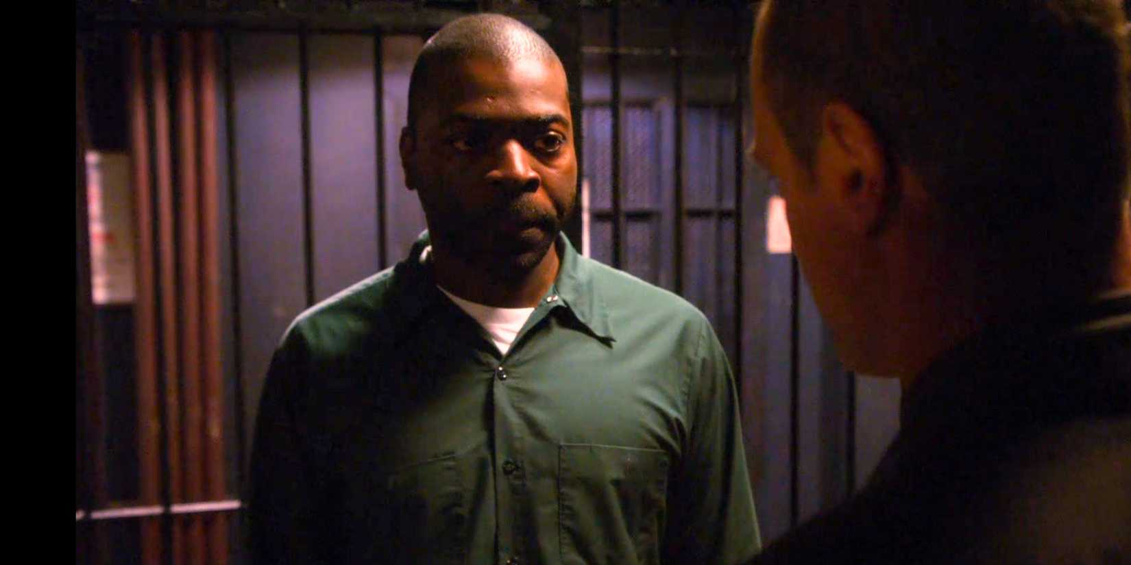 Victor Tate (Chike Johnson) talks to Elliot Stabler (Christopher Meloni) in a cell in Law & Order: SVU season 11, episode 1 "Unstable"