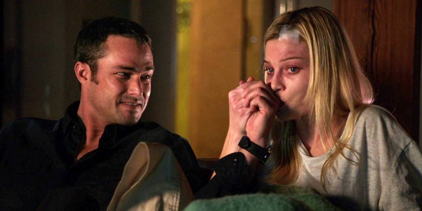 Taylor Kinney as Kelly Severide and Lauren German as Leslie Shay in Chicago Fire season 1, episode 11