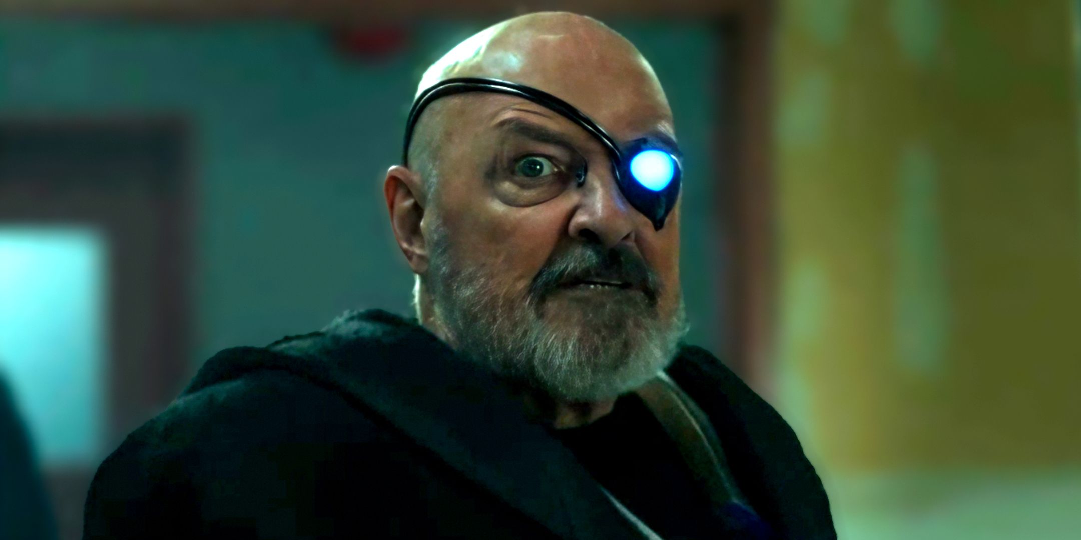 Terry O'Quinn as Peter looking intense in his cyborg form in Resident Alien season 4
