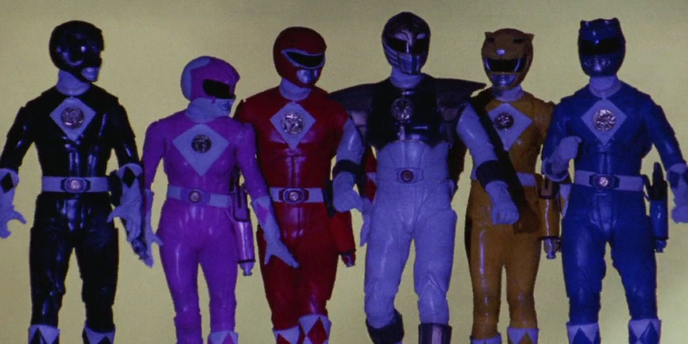 The Might Morphin Power Rangers standing together in the 1995 movie