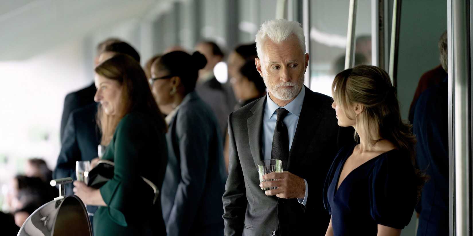 John Slattery as Leo Drummond and Madison Iseman as Sarah Plankmore in The Rainmaker