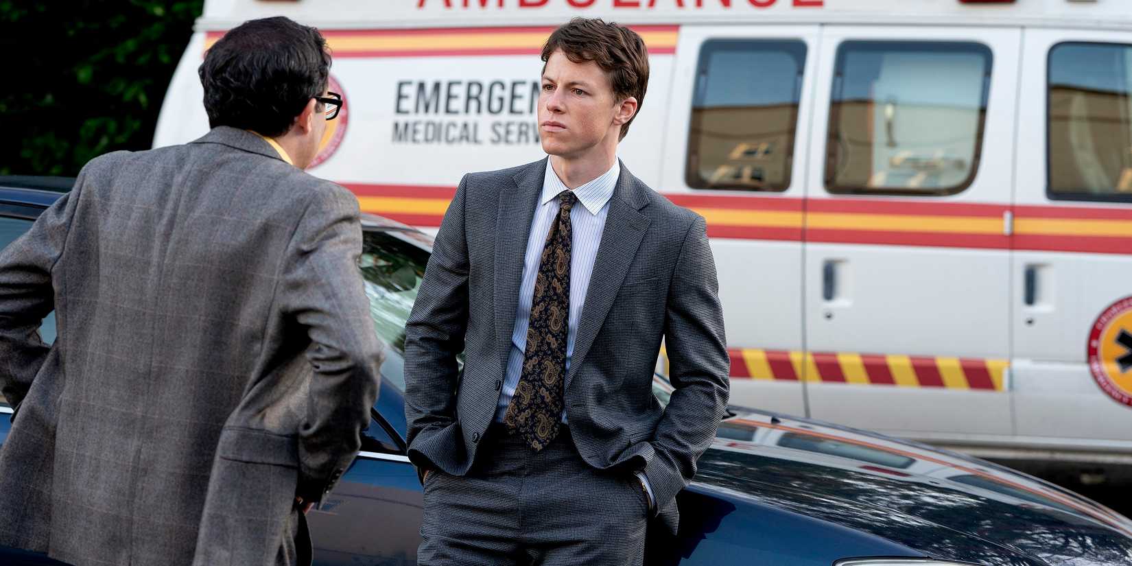 P.J. Byrne as Deck Sifflet and Milo Callaghan as Rudy Baylor in The Rainmaker