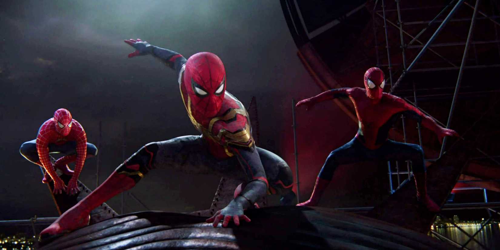 Three Spider-Men pose together on the Statue of Liberty in Spider-Man No Way Home-1